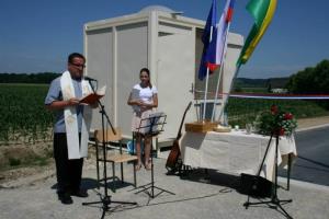 Otvoritev v vasi Levanjci 6